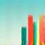 Abstract icon representing a rising bar chart.